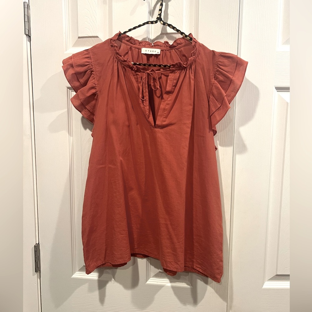 Stark brand burnt orange glitter sleeve blouse